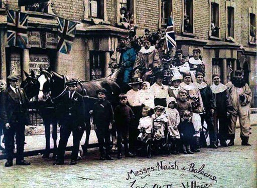 Archive photograph of the Naish family firm with their horse-drawn cart in a London street